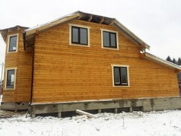 Строительство дома из бруса - проект  047 "Торбйорн" с дополнением гаража  